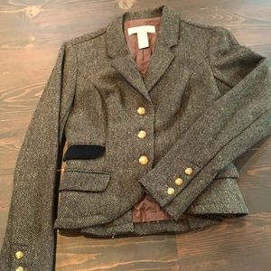 Wool blend jacket with trendy strap in back.